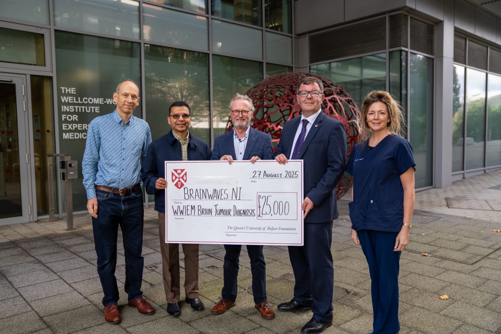 Main photo showing the team behind the collaborative project referenced in the article. From left to right, the 5 people in the photo are as follows: Professor David Simpson, Professor of Genomics, Professor Charuhas Thakar, Centre Director, WWEIM, Colin McMillan, Chair of Brainwaves NI, Professor Ian Bruce, Faculty Pro-Vice-Chancellor, Medicine, Health and Life Sciences and Dr Estelle Healy, Consultant Neuropathologist with the Belfast Health and Social Care Trust