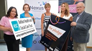 Members of Belfast Trust join Nexus NI in a pledge to work to end violence against women and girls.